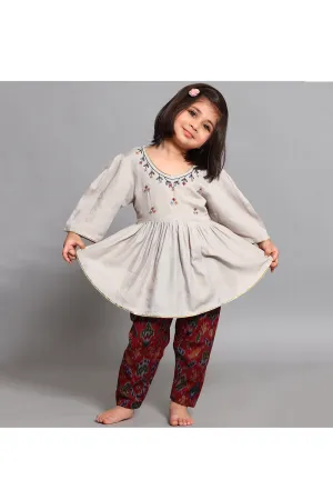 Grey peplum style kurta with red printed pants