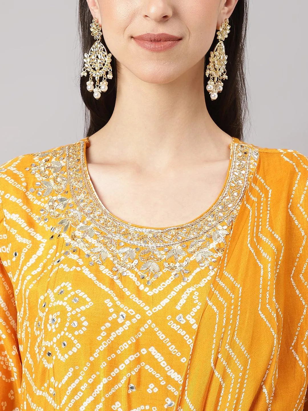Jashvi Mustard bandhani Printed Muslin Zari work Drape Style Flared Gown